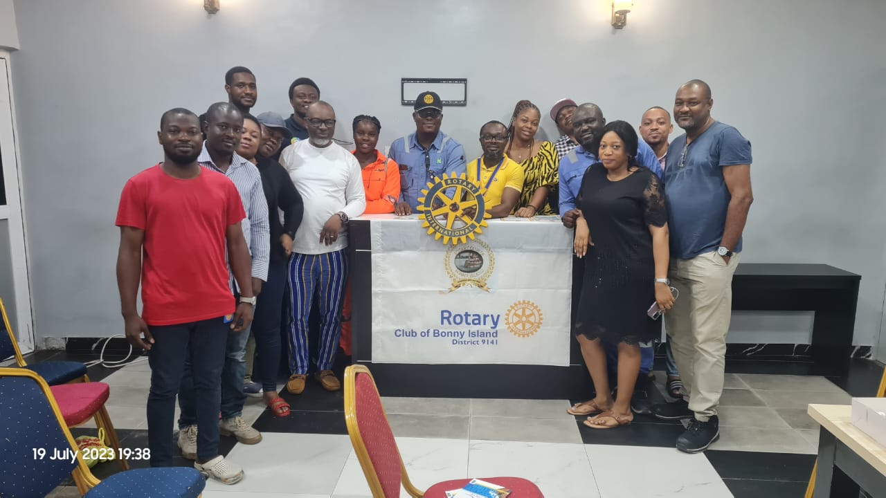 Rotary Club of Bonny Island members gathered at a club meeting